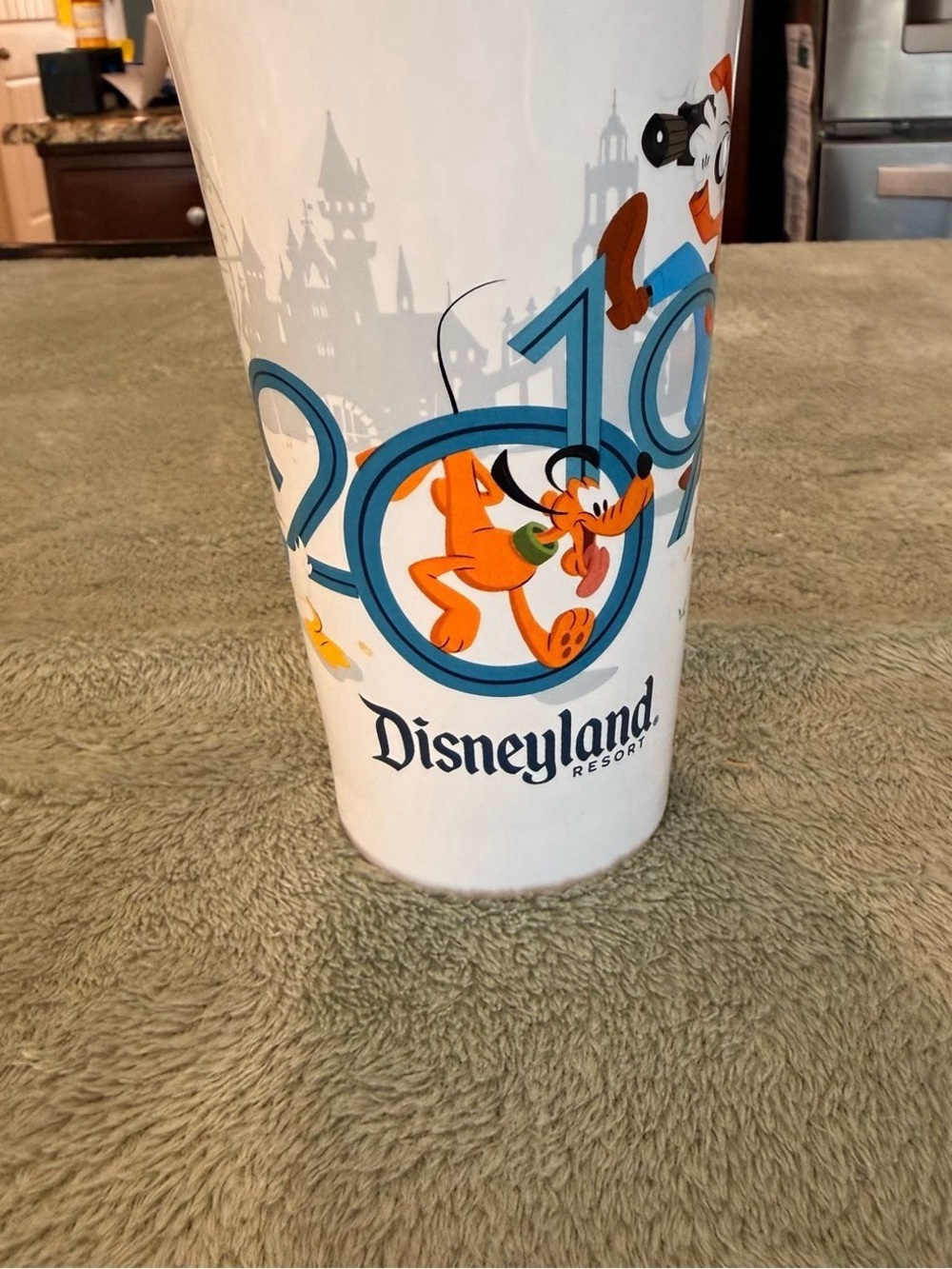 White Pluto Graphic Cup — Orange & Blue Design